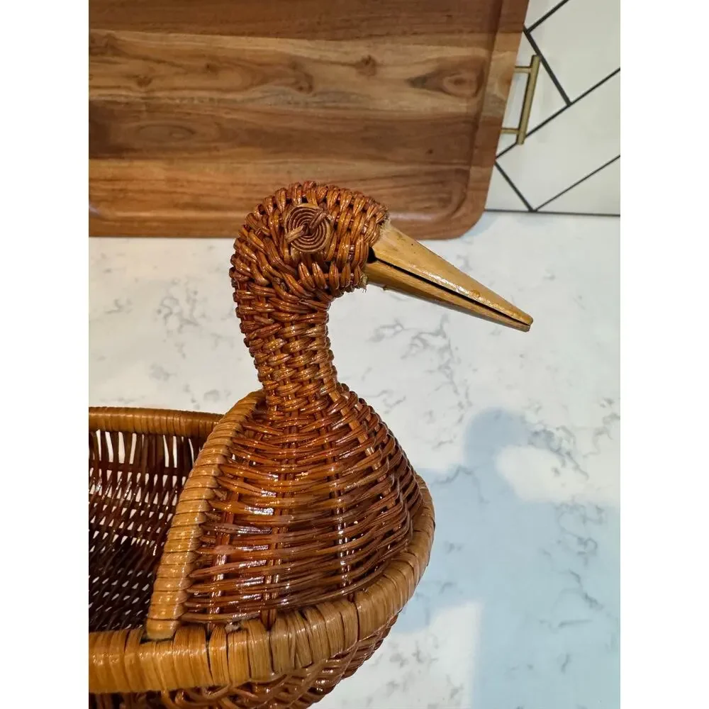 handwoven rattan duck basket elongated oval bowl design integrated duck head